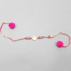 Clearance Pink Rakhi Adorned With An Embossed Swastik BOY Rakhis | Rakhis